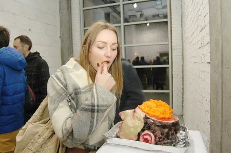 Tasting the cake during the event