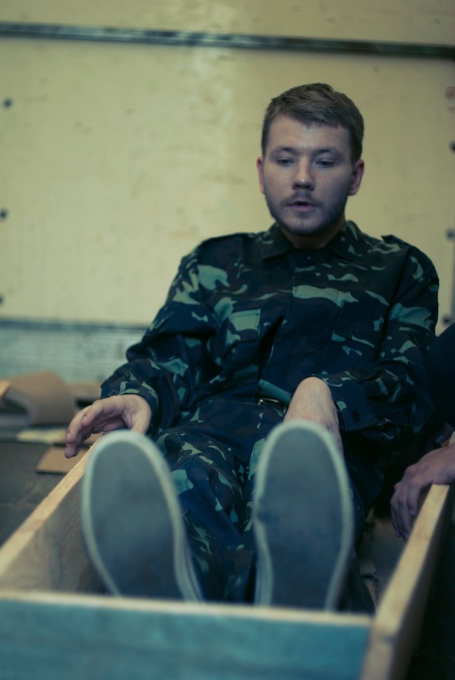 Portrait in military uniform — detail of the performance.
