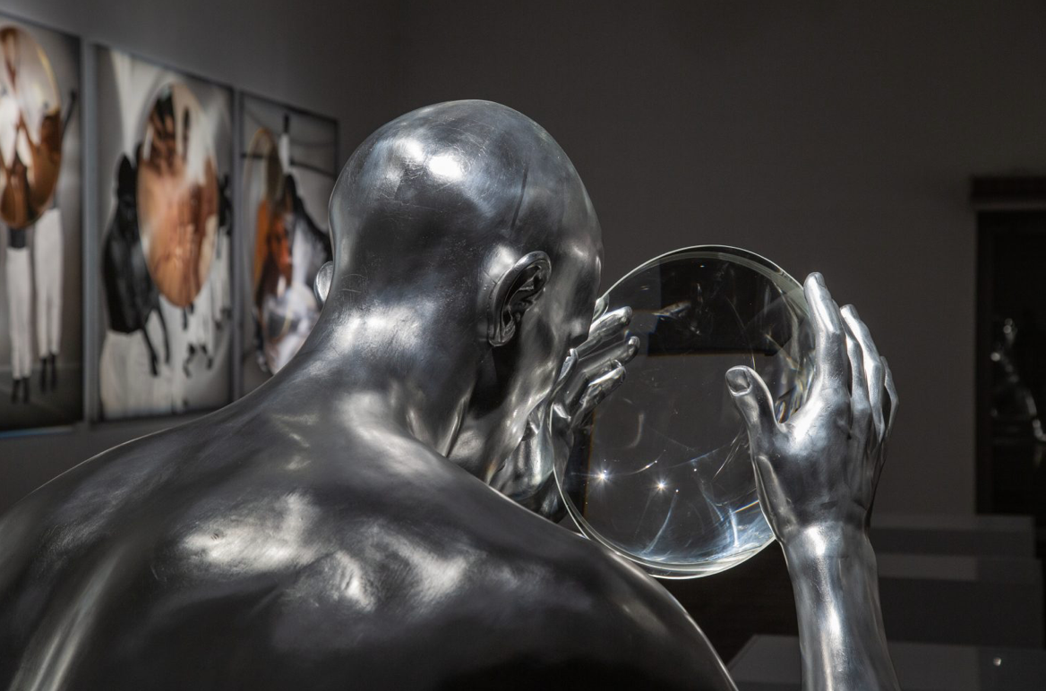 Viktor Sydorenko. Sculpture with a magnifying glass, Zero Year. The Idea of Light — detail. M17